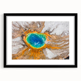 Abstract art print of Yellowstone scenery in muted earth tones on a black framed canvas, suitable for dining room decor.