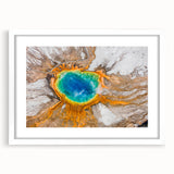 Textured art depicting abstract Yellowstone scenery in muted earth tones on a framed white mat, ideal for bedroom art.
