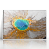 Mid-century modernist art of Yellowstone scenery on white-framed acrylic, featuring muted earth tones.