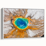 Vintage poster art of Yellowstone scenery in vibrant colors on a framed canvas, ideal for living room decor.