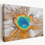 Yellowstone National Park landscape on large stretched canvas, featuring lush greenery and a waterfall.