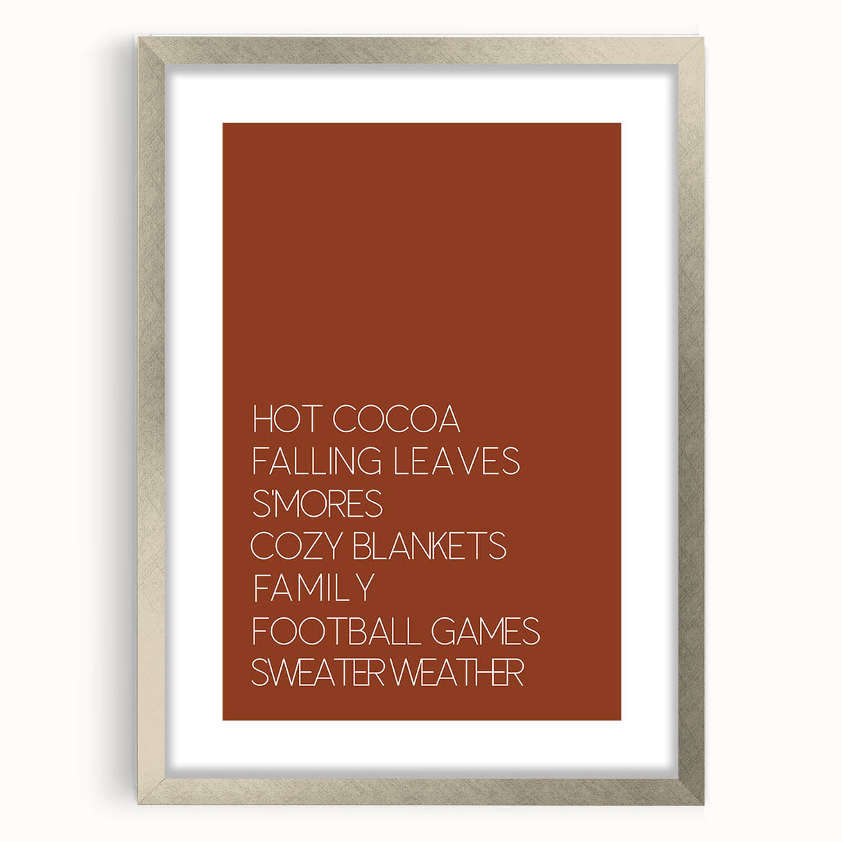 Textured abstract art print in warm autumn hues on a silver-framed canvas, suitable for bedroom decor.