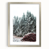 Textured art depicting a winter scene in abstract style, with cool blue and white tones on a silver-framed mat.