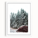 Abstract art print depicting a winter scene in muted blue and white tones on a framed canvas, suitable for dining room decor.