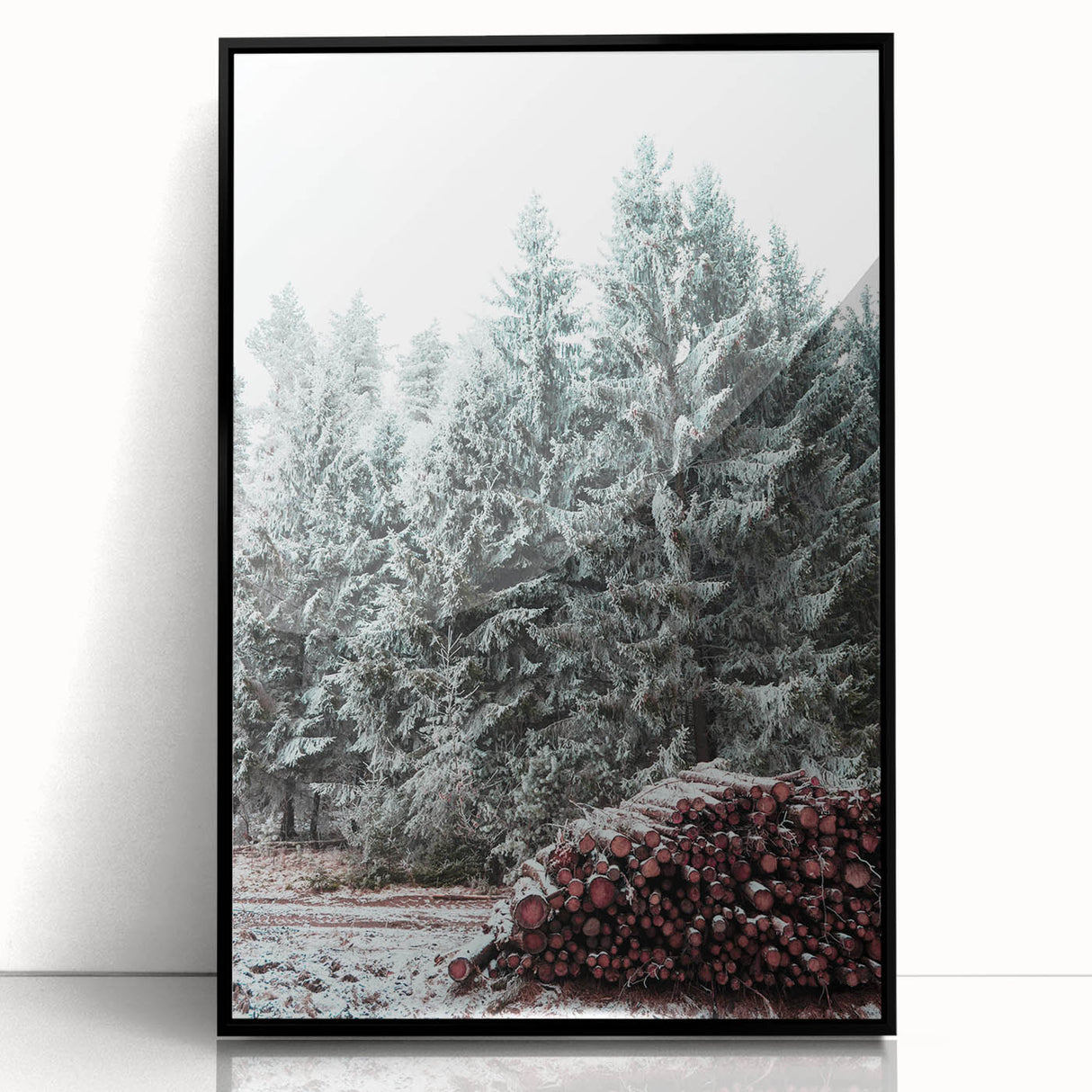 Large abstract wall art depicting a winter scene in muted blue and white tones on a framed acrylic.