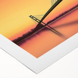 Art deco poster of a geometric building, in muted gold and navy, on rolled canvas, suitable for dining room walls.