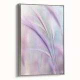 Framed botanical canvas art with a silver border, showcasing intricate floral designs in vibrant colors, perfect for enhancing home decor elegance.