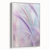Framed botanical canvas art showcasing vibrant floral designs in elegant colors, with a sleek white frame, perfect for enhancing home decor.