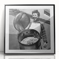 Large abstract wall art depicting people and food in mid-century modernist style, framed in black acrylic.