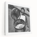 Large art on stretched canvas featuring a colorful illustration of diverse people enjoying food.