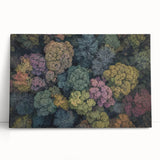 Stretched canvas art depicting a vibrant landscape scene with rich colors, leaning against a wall, perfect for home or office decor, highlighting nature's beauty.