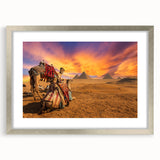 Abstract art print of an Egyptian landscape in muted earth tones on a framed silver mat, ideal for dining room decor.