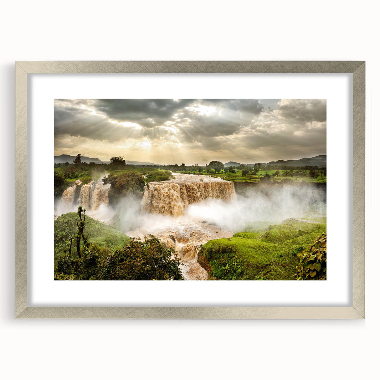Abstract art print depicting an Ethiopian landscape in muted earth tones, framed with a silver mat.
