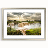 Abstract art print depicting an Ethiopian landscape in muted earth tones, framed with a silver mat.