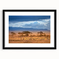 Extra large abstract art print of colorful Kenyan scenery on textured canvas, framed in black, ideal for living room decor.