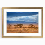 Textured abstract art print depicting a serene African landscape in warm earth tones on a framed canvas.