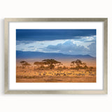 Abstract art print of a Kenyan landscape in muted earth tones on a framed canvas, suitable for bedroom or dining room decor.