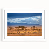 Extra large abstract art print of African scenery in textured style, displayed in a white framed mat.