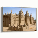 Vintage poster art of a Mali scenery in vibrant colors on a silver-framed canvas, ideal for living room decor.
