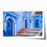 Rolled print of a Moroccan landscape with vibrant floral elements in earth tones, ideal for art wall dining room.