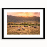 Extra large abstract print of colorful Tanzanian scenery on textured canvas, framed in black, ideal for living room decor.