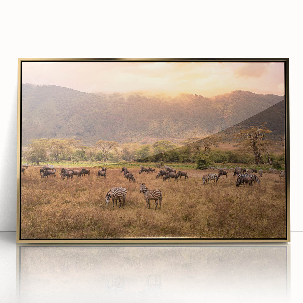 Framed acrylic print of a Tanzanian landscape in gold and green tones, ideal for modern art wall decor or a nursery.