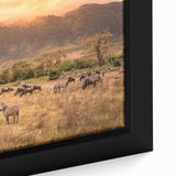 Close-up of a textured black wall art featuring a colorful African landscape on framed canvas, ideal for living room decor.