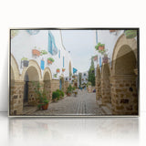 Mid-century modernist art of a Tunisian landscape on silver-framed acrylic, featuring earthy tones.