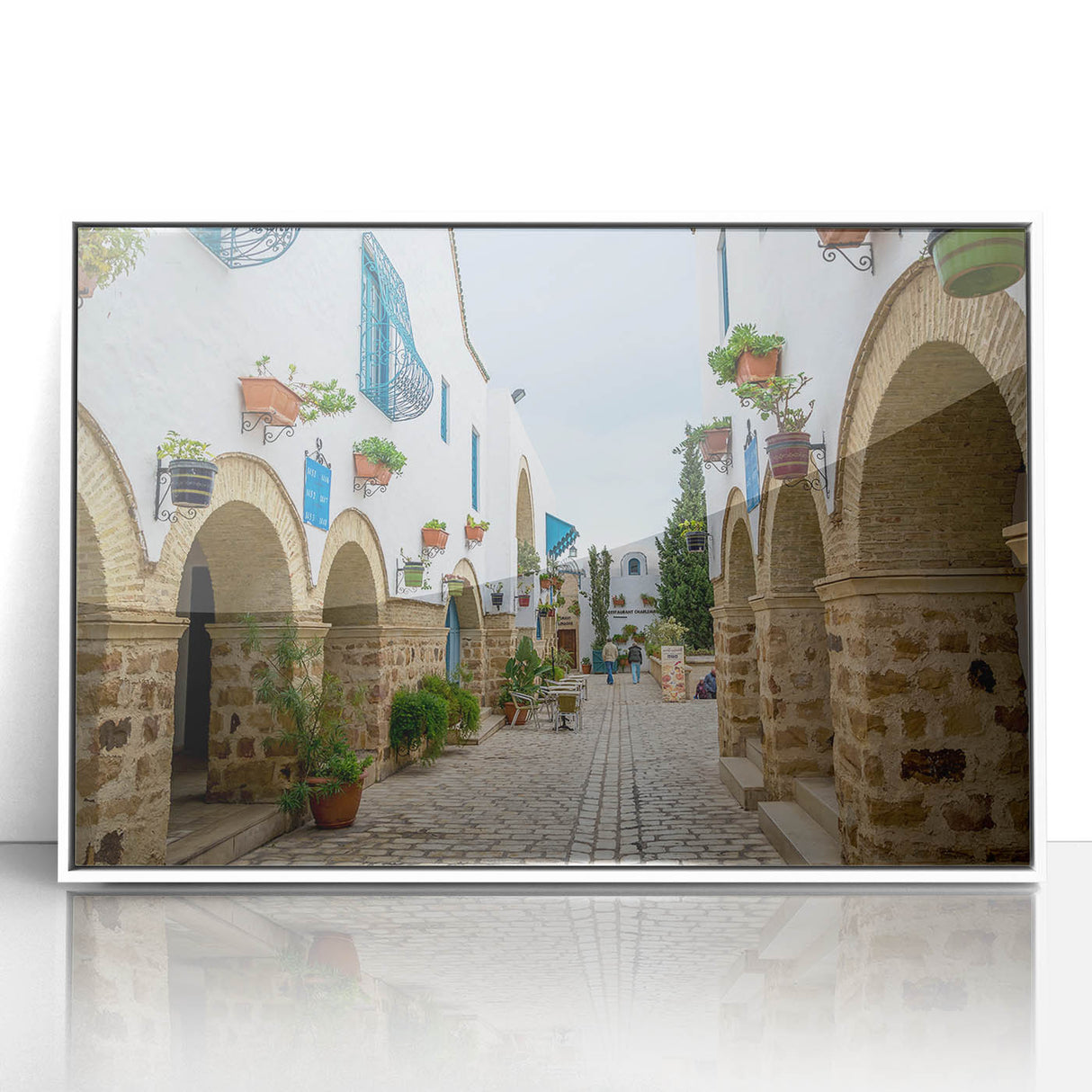 Art deco poster depicting a Tunisian landscape in muted earth tones on a framed acrylic, ideal for modern art wall decor.