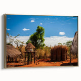 Framed canvas of a vintage-style African landscape in muted earth tones, ideal for bedroom wall decor.