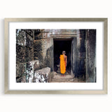 Textured abstract art print depicting Cambodian scenery in muted earth tones, framed with a silver mat.