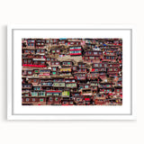 Abstract art print of a Tibetan landscape in muted blue and green tones on a white framed canvas.