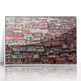 Acrylic print of a Tibetan landscape in muted earth tones, framed in white, suitable as modern art wall decor.