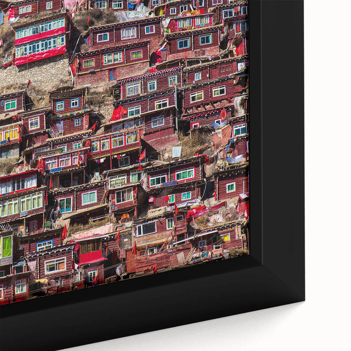 Black wall art featuring a textured, colorful Tibetan landscape on a framed canvas, ideal for living room decor.