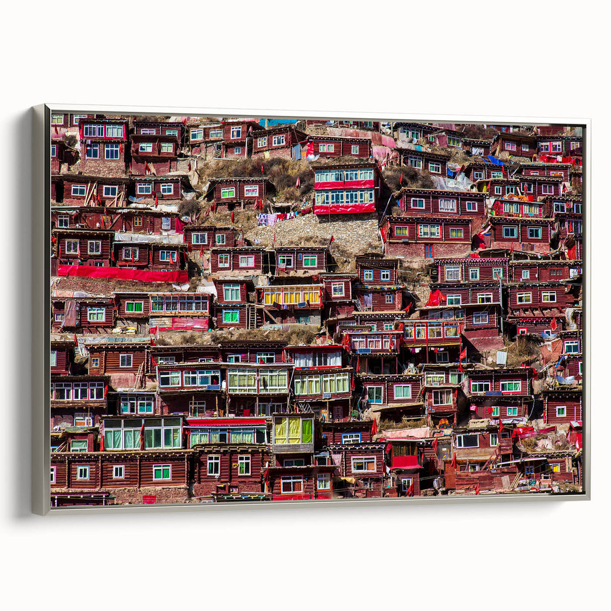 Framed canvas featuring a vintage-style landscape painting of Tibet in muted silver and black tones.