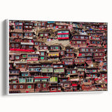 Framed canvas featuring a vintage-style landscape painting of Tibet with colorful and black elements.