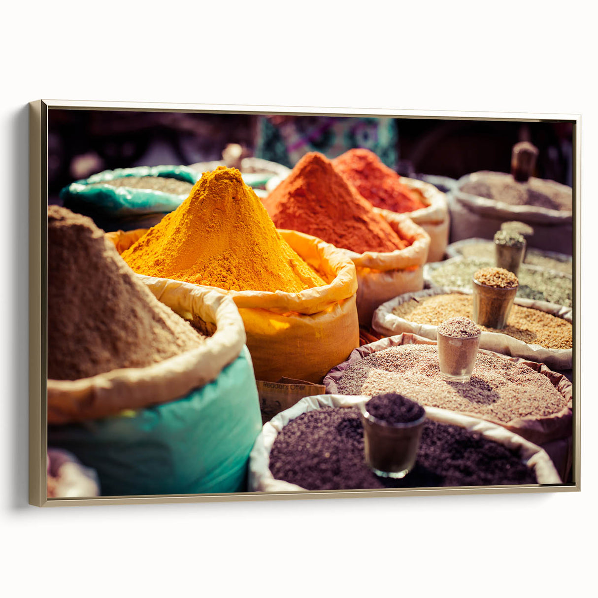 Framed canvas featuring a vintage-style landscape painting of an Indian scenery in gold and black tones.