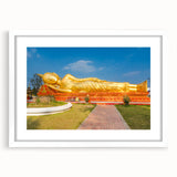 Abstract art print of a serene Laotian landscape in muted green and blue tones, framed with a white mat.