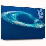 Large abstract wall art of a tranquil Maldives beach scene in muted blue and green tones, printed on acrylic glass.