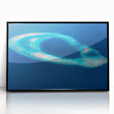 Large abstract wall art depicting a serene Maldivian scenery in muted blue and green tones on a framed acrylic.