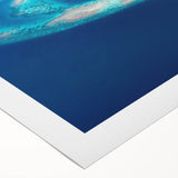 Art deco poster of a serene Maldivian beach scene in soft blue and white tones on rolled canvas.