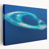 Side view of a stretched canvas depicting the serene Maldives scenery in calming blue and turquoise hues.