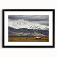 Extra large abstract art print featuring textured, colorful scenery of Mongolia on a framed black mat.