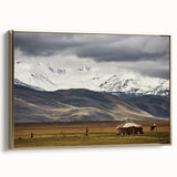 Framed canvas wall art depicting a vintage-style Mongolian landscape in muted gold and black tones, ideal for bedroom decor.