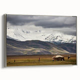 Framed canvas featuring a vintage-style Mongolian landscape with colorful art and black border, ideal for living room decor.