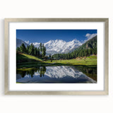 Textured abstract art print depicting a serene Pakistani landscape in muted earth tones, framed in silver.