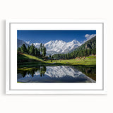 Abstract art print depicting a serene Pakistani landscape in muted earth tones, framed with a white mat.