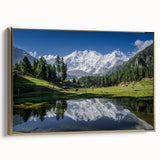 Framed canvas featuring a vintage-style landscape painting of a Pakistani scenery in muted gold and black.