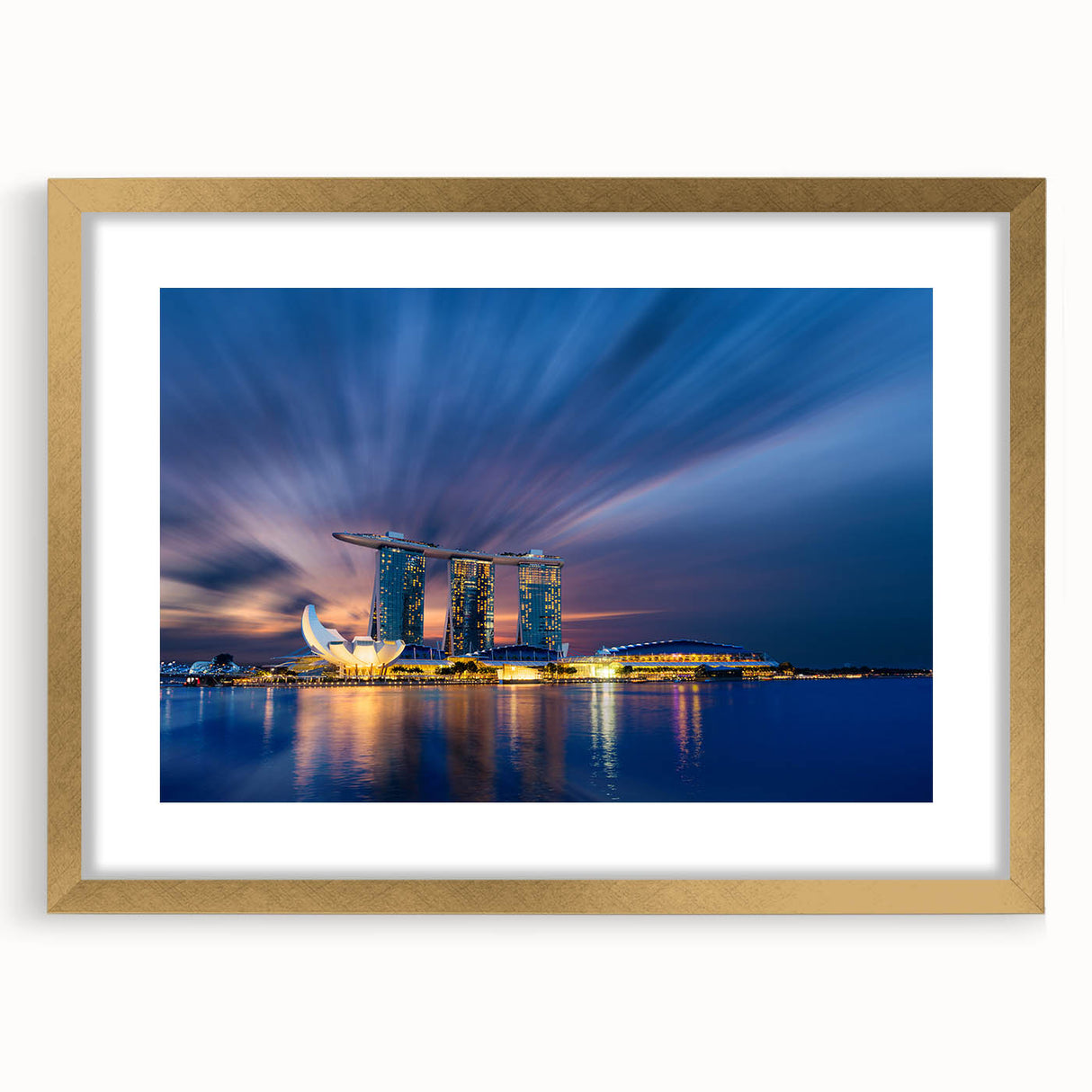 Extra large abstract art print of Singapore scenery in gold frame, featuring textured hues of blue and green.