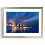 Textured art depicting a stylized Singapore skyline in muted gray and blue tones on a framed poster.
